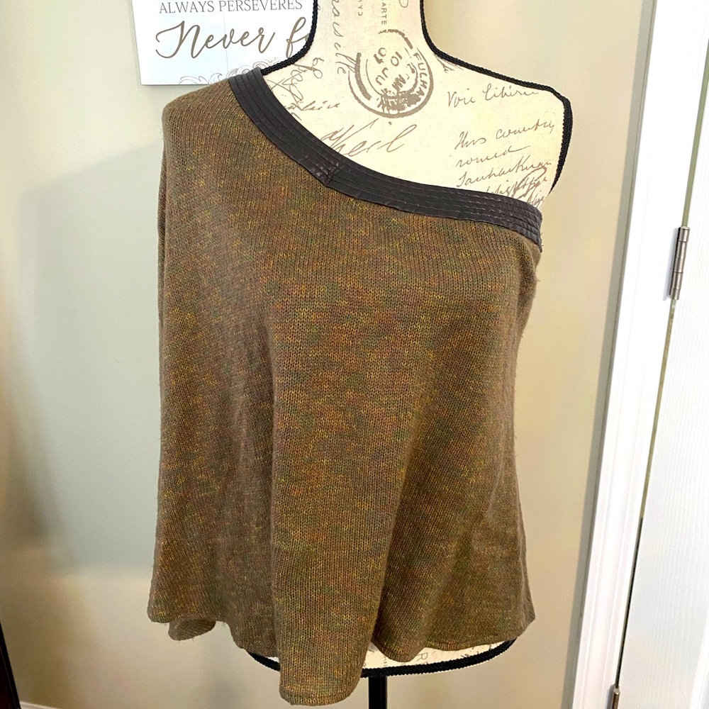 Off shoulder one sleeve sweater. Great condition